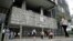 People walk in front of Brazilian oil company Petrobras's headquarters in Rio de Janeiro, Nov. 14, 2014.