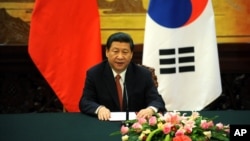 Chinese President Xi Jinping gives a speech during a joint declaration ceremony with South Korea at the Great Hall of the People in Beijing , June 27, 2013. 