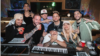 Fotografía de los artistas colombianos Maluma, J Balvin, Feid, DFZM, Ovy On The Drums, Maluma, Ryan Castro, Karol G, y Blessd, como parte de su colaboración para la canción '+57'. CORTESÍA: Instagram Karol G