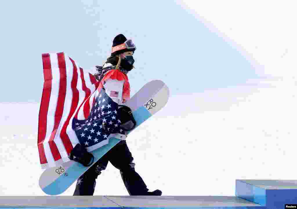 Gold medalist Chloe Kim of the United States walks during the flower ceremony at the 2022 Beijing Olympics at Genting Snow Park, Zhangjiakou, China.