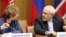 European Union's Catherine Ashton, left, and Iran's Mohammad Javad Zarif await start of closed-door nuclear talks, Vienna, June 17, 2014.