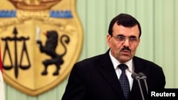 Tunisia's Prime Minister-designate Ali Larayedh speaks during a news conference after his meeting with Tunisia's President Moncef Marzouki (not seen) in Tunis, March 7, 2013.