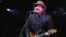 Jeff Tweedy, leader of rock band Wilco, sings at a performance at Wolf Trap Park for the Performing Arts outside Washington where his band is supporting HeadCount, a non-profit, non-partisan organization registering people for upcoming elections, August 2
