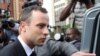 Oscar Pistorius leaves the high court in Pretoria, April 9, 2014. 