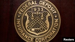 FILE - The Federal Deposit Insurance Corp (FDIC) logo is seen at the FDIC headquarters.