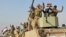Iraqi security forces deploy in Rawah, northwest of Baghdad, Iraq, Nov. 17, 2017. Iraqi forces backed by the U.S.-led coalition retook the last town in the country that was held by the Islamic State group.