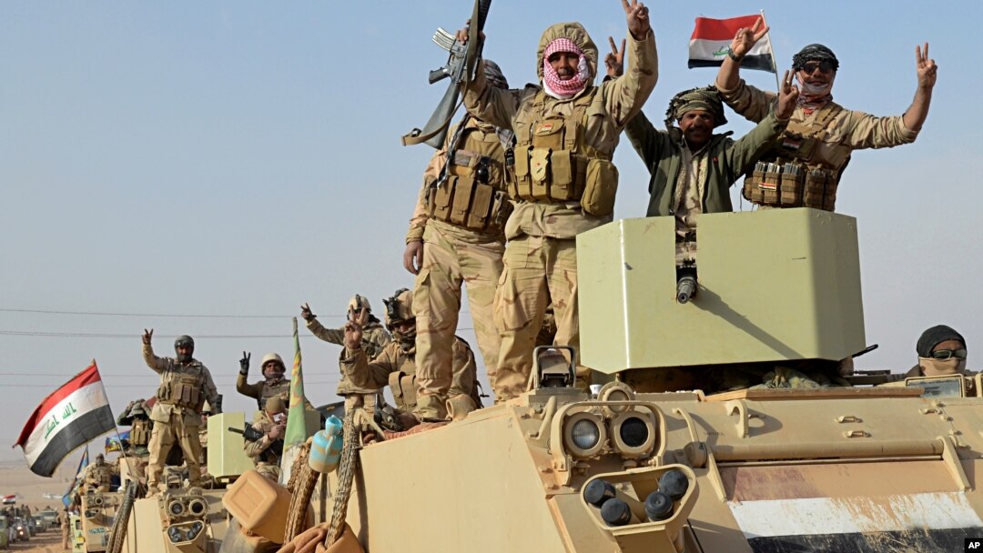 Iraqi security forces deploy in Rawah, northwest of Baghdad, Iraq, Nov. 17, 2017. Iraqi forces backed by the U.S.-led coalition retook the last town in the country that was held by the Islamic State group.