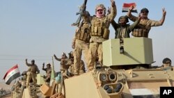 Iraqi security forces deploy in Rawah, northwest of Baghdad, Iraq, Nov. 17, 2017. Iraqi forces backed by the U.S.-led coalition retook the last town in the country that was held by the Islamic State group.