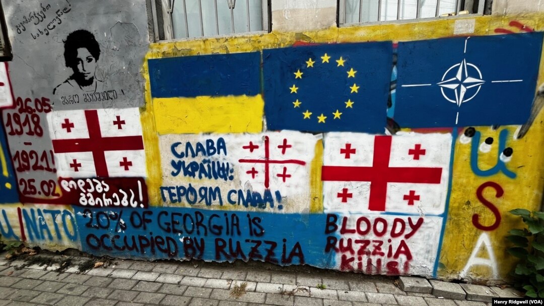 Pro-Western, anti-Russian graffiti can be seen on the streets of Tbilisi, Georgia, Oct. 11, 2024, in the run-up to elections on Oct. 26.