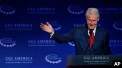 FILE - Former president Bill Clinton speaks at a gathering of the Clinton Global Initiative America, which is a part of The Clinton Foundation, in Denver, Colorado, June 10, 2015.