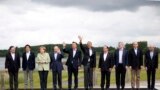 G8 leaders pose for a group photo at the G8 summit at the Lough Erne golf resort in Enniskillen, Northern Ireland, June 18, 2013. 