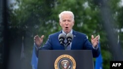 President Joe Biden speaks during a drive-in rally at Infinite Energy Center, April 29, 2021, in Duluth, Ga.