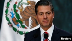 Mexico's President Enrique Pena Nieto gives a speech at the National Palace in Mexico City, Nov. 21 2017. 