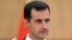 ປະທານາທິບໍດີ Bashar al-Assad ແຫ່ງຊີເຣຍ.
ວັນທີ 3 ມິຖຸນາ 2012.