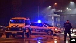 Police block off the area around the U.S. Embassy in Montenegro's capital Podgorica, Feb. 22, 2018. Local media say that an unknown assailant hurled a hand grenade toward the embassy around midnight local time (1100 GMT) and then killed himself with anoth