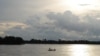 A fishing boat floats on the Mekong river at Sambor in Cambodia's Kratie Provice, another site in the country that has been chosen for a proposed 18-kilometer hydro-dam.