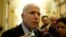 Senator John McCain, an Arizona Republican, speaks to reporters as he arrives for the Republican policy luncheon on Capitol Hill in Washington, Feb. 14, 2017. 