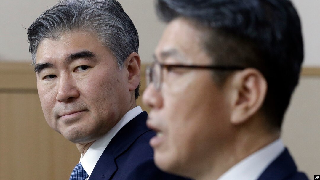 U.S. State Department's Special Representative for North Korea Policy Sung Kim, left, watches as his South Korean counterpart Kim Hong-kyun speaks during a joint press conference after their meeting to exchange views on North Korea's fifth nuclear test conducted on last Friday at the Foreign Ministry in Seoul, South Korea, Tuesday, Sept. 13, 2016.