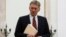 FILE - Russian President Vladimir Putin's spokesman Dmitry Peskov is seen at the Kremlin in Moscow, Russia, March 27, 2017.