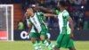 Nigeria's defender William Troost-Ekong (L) celebrates after scoring his team's second goal during the football match between Guinea-Bissau and Nigeria in Cameroon, Jan. 19, 2022.