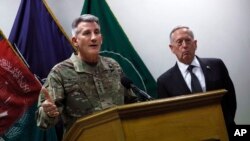 U.S. Defense Secretary James Mattis, right, and U.S. Army General John Nicholson, left, commander of U.S. Forces Afghanistan, hold a news conference at Resolute Support headquarters in Kabul, Afghanistan, April 24, 2017. 