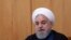 FILE - Iranian President Hassan Rouhani, pictured in Tehran, Oct. 2, 2019, said Saturday that he was saddened by the mistaken shootdown of a Ukrainian jet and expressed "my deep condolences to the families of victims of this painful catastrophe."