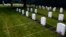 FILE - Headstones are seen at the cemetery of the U.S. Army's Carlisle Barracks, Friday, June 10, 2022, in Carlisle, Pa. The remains of nine more Native American children who died at a government-run boarding school were disinterred and returned to families, authorities said. 