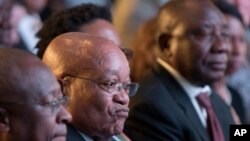 President Jacob Zuma (C) and deputy president Cyril Ramaphosa (R) attend the declaration announcement of the municipal elections in Pretoria, South Africa, Aug. 6, 2016. This is the worst-ever election showing for South Africa's ruling party. 