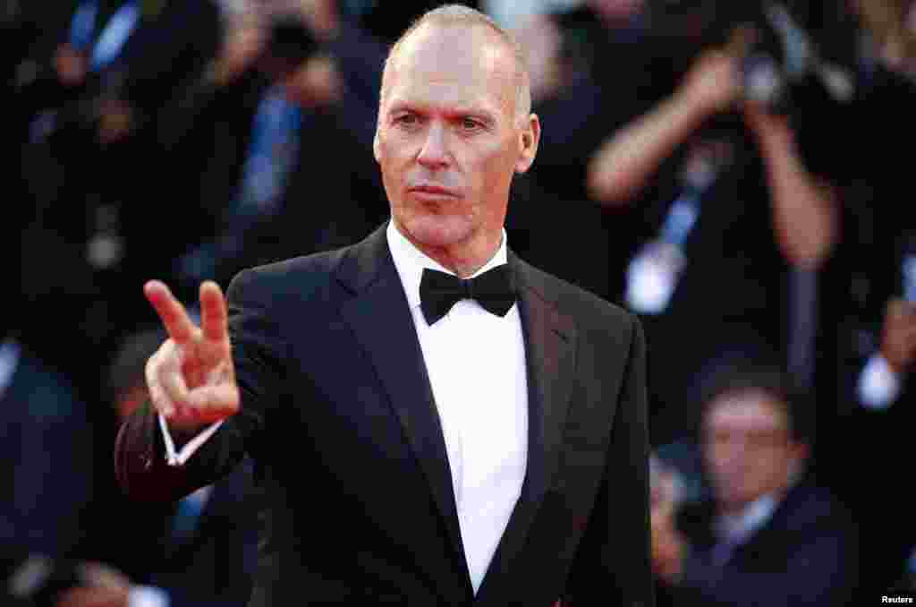 FILE - Actor Michael Keaton, who received a Golden Globe nomination for best actor in a comedy or musical for his role in "Birdman," appears at the 71st Venice Film Festival, Aug. 27, 2014. 