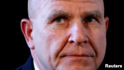 Newly appointed National Security Adviser Army Lt. Gen. H.R. McMaster listens as U.S. President Donald Trump makes the announcement at his Mar-a-Lago estate in Palm Beach, Florida U.S. Feb. 20, 2017. 
