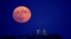 A supermoon rises over the Temple of Poseidon, on Cape Sounion, near Athens, Greece, Aug. 19, 2024.&nbsp;