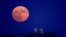 A supermoon rises over the Temple of Poseidon, on Cape Sounion, near Athens, Greece, Aug. 19, 2024.&nbsp;
