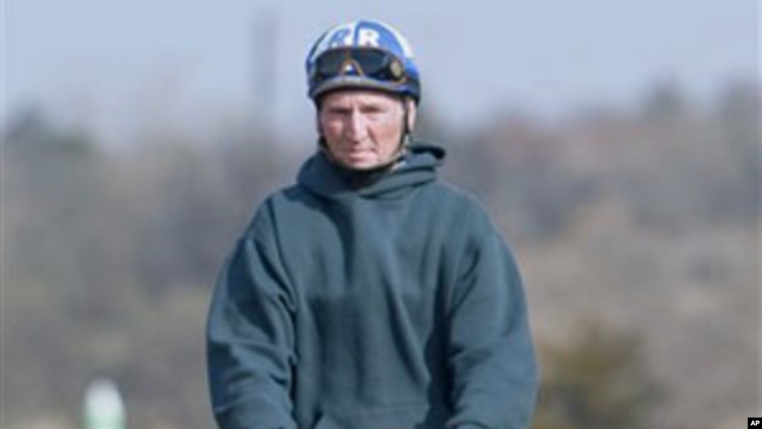 Jockey Roy Brooks goes for a morning trot on one of the race horses he rode for his return to the race track at Remington Park in Oklahoma City