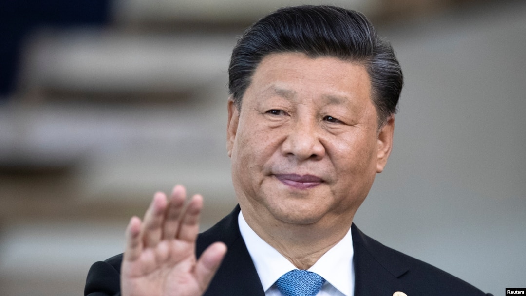 2019年11月14日，中国国家主席习近平在巴西的巴西利亚参加金砖国家峰会前向媒体致意。（路透社）