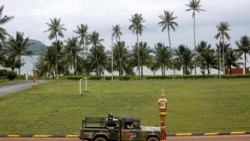 Sailors sit on a truck at the Cambodian Ream Naval Base, July 26, 2019. (Samrang Pring/Reuters)