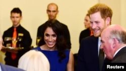 Duke dan Duchess of Sussex, Pangeran Harry dan istrinya, Meghan, menghadiri konser gala untuk kegiatan amal veteran militer di London, Inggris, 6 September 2018.