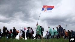 Studenti u maršu ka Beogradu, 13.mart 2025. (AP Photo/Armin Durgut)
