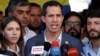 Venezuelan opposition leader Juan Guaido, whom a number of nations have recognized as the country's rightful interim president, talks to the media after attending a religious service in Caracas, Venezuela, Feb. 10, 2019. 