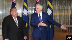 Nauru President Baron Divavesi Waqa, left, meets with Australian Prime Minister Malcolm Turnbull at the Commonwealth Parliamentary Offices in Sydney, April 6, 2017.