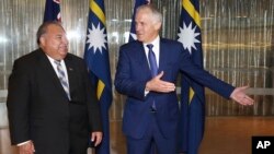 Nauru President Baron Divavesi Waqa, left, meets with Australian Prime Minister Malcolm Turnbull at the Commonwealth Parliamentary Offices in Sydney, April 6, 2017.