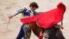 Spanish bullfighter El Juli performs during a bullfight at the San Fermin festival in Pamplona, Spain.