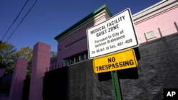  FILE - A sign indicating a "Medical Facility Quiet Zone" is displayed outside the Jackson Women's Health Organization clinic in Jackson, Miss., the state's only state licensed abortion facility, Wednesday, Nov. 18, 2020. (AP Photo/Rogelio V. Solis, File)