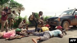 FILE: In December 1989 an armed insurrection by rebel forces began in Nimba County. In early 1990 several hundred death ensued in fighting between the AFL and rebels, who claimed to be members of opposition group the NPFL, led by a former government official, Charles Taylor