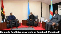 Presidentes João Lourenço, de Angola (esq), Paul Kagame, do Ruanda (cen) e Felix Tshisekedi, da RDC, Luanda, 21 Fevereiro 2020