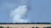 FILE - This photograph taken on July 7, 2022 shows smoke billowing after shelling on the outskirts of the city of Sloviansk. 