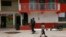 A police officer patrols in Cerocahui, Mexico, June 22, 2022. The two elderly priests were killed inside the church, where a man pursued by gunmen apparently sought refuge, the religious order´s Mexican branch announced Tuesday.