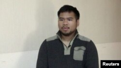 Andy Tai trong một video do truyền thông nhà nước Nga công bố sau khi bị bắt.