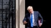 Embattled British PM Vows to Stay in Office 