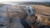 FILE - The Theewaterskloof Dam, which supplies most of Cape Town's potable water, is seen from above near Villiersdorp, South Africa, February 20, 2018. A similar water shortage is happening in the country's Nelson Mandela Bay area.