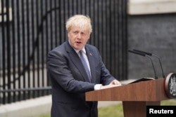 FILE - British Prime Minister Boris Johnson makes a statement at Downing Street in London, July 7, 2022.